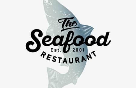 рыба с надписью Seafood ресторан